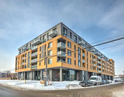Contact us at 514-618-8298 Experience the ultimate in modern living with our new apartments in a hig...