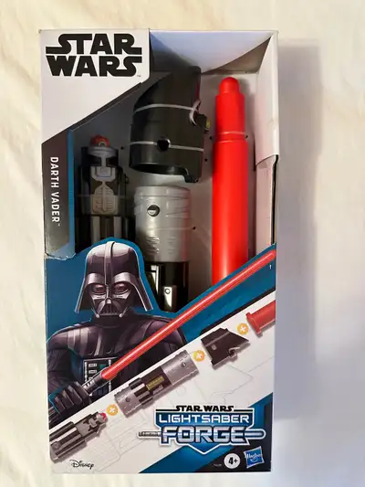 For sale is a brand new unopened Disney hasbro Star Wars Darth Vader Lightsaber Forge. The item come...