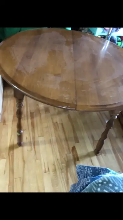 Circle wood dining table. , View more
