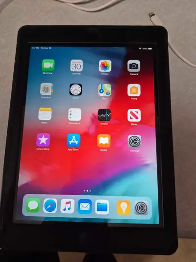 1st Gen Apple iPad - 32gb. LIKE NEW. Otterbox case w/ original charging block & cable. Ios
