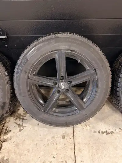 Set of 4 michellin x-ice snow tires 235/60/18 on 5x114.3 or 5x4.5 rims that are 18x8 Whole setup may...