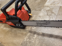 Brand new milwaukee 16" cordless chainsaw