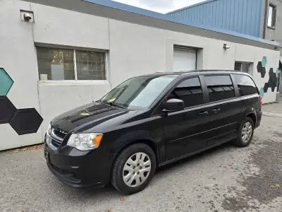 2015 caravan with stow n go seats. Good tires. Check engine light is on. Transmission is a little ju...