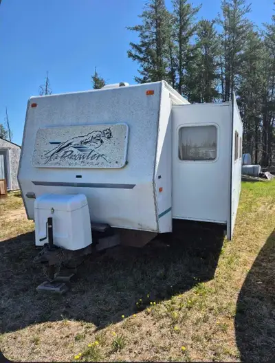 29ft camper, 13ft slide, good shape. Text 306 862 1315