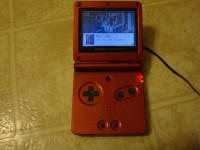GameBoy Advance SP AGS 001 with power adapter + games