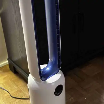 Cool down your space with this bladeless fan! This tower fan features a sleek design, multiple speed...