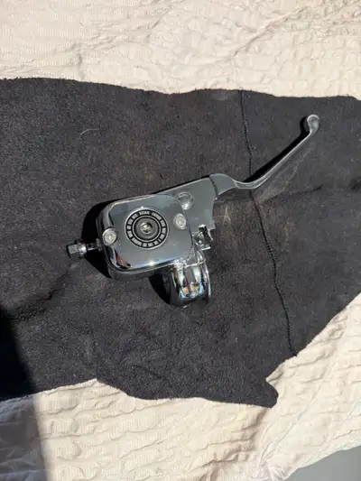 BRAND NEW, NEVER USED. Ended up finding original HD front brake master cylinder for my bike on Marle...