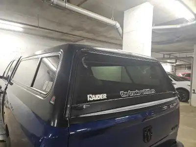 Raider Truck Cap, on a ram 1500 6'4 box. Windows and locks all work perfect. 403 497 1325 Fort Mcmur...
