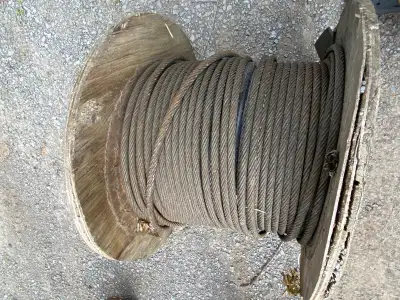 About 75’ of winch cable still on the spool 1/2” **length determined by weight**
