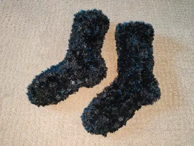I am selling a Women Plush Black Non-Slip Sock in new, tags off, never used condition. Stay warm and...