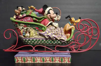 Walt Disney Showcase - Jim Shore - Laughing All the Way Figurine is a beautifully crafted sculpture...