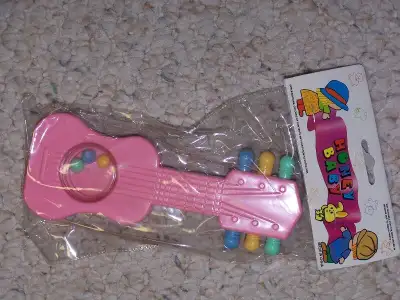 MINI GUITAR • Colorful Toys: Mini Guitar • Brand: “Honey Baby” • These colorful mini guitars are smo...