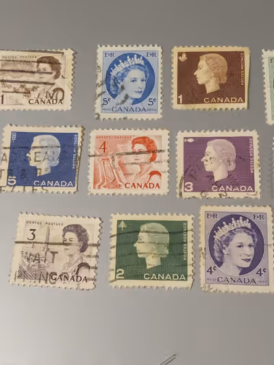 For sale. Vintage Queen Elizabeth Canadian Stamps Excellent Condition Lot of 14. Please see pictures...