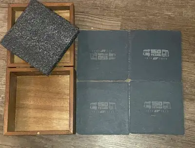 Selling a set of four slate coasters 150th anniversary of London transit LTC with wooden box asking...