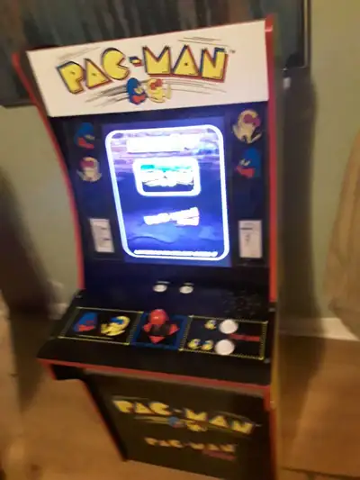 Bring the classic arcade experience home with this pre-loved Arcade1Up Pac-Man machine, which featur...