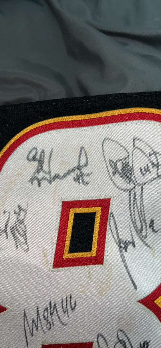 Autographed Calgary flames jersey  in Hockey in Brandon - Image 4