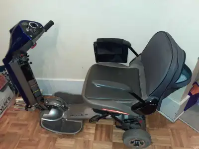 Electric Scooter comes with Three bags. One under the seat , one on the back of the chair, and one o...