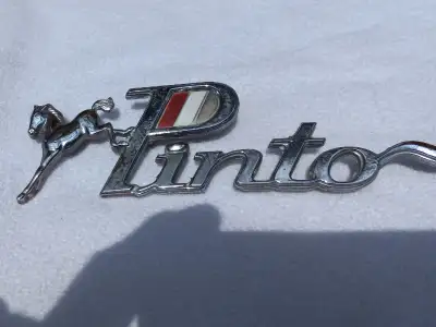 Prestine Pinto car emblem.
