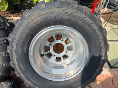 ATV Tire and rims practically brand new they were only on the ATV for about 2 weeks they are 4.5 top...