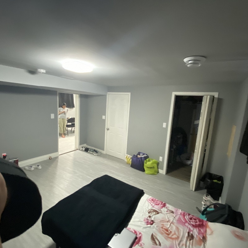 Shared ensuite bedroom (private 2 pc bath) in a legal basement Room
