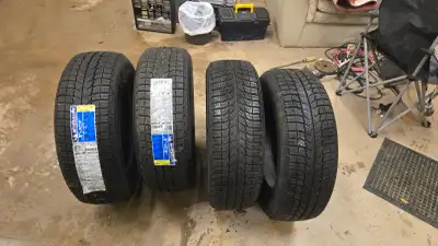 Michelin X-ICE 205 65 R15 (2) new and (2) barely used $250 or best offer Hercules Avalanche 205 65 R...