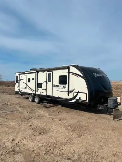 2014 North Trail 32RLTS by Heartland. Excellent shape, lots of room. Queen size bed. 3 slide outs. L...
