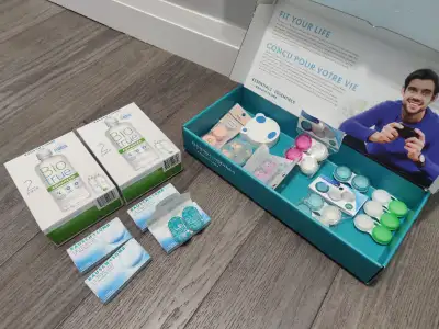Contact lenses plus solution plus cases, View more