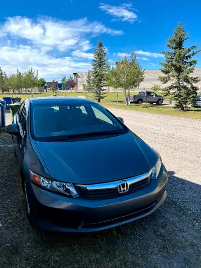 2012 Honda Civic - 4 door/ 312527 km / oil and filter changed, spark plugs replaced, air filter repl...