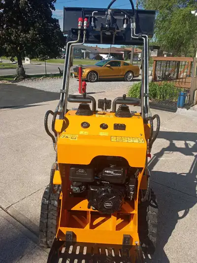 My Skid steer,loader, operates same as a Kubota, Caterpillar, johndeere,bobcat, $5,000.00 cash total...