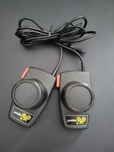 Atari 2600 Paddle Controllers. In great working condition. Please see pictures for reference. Please...