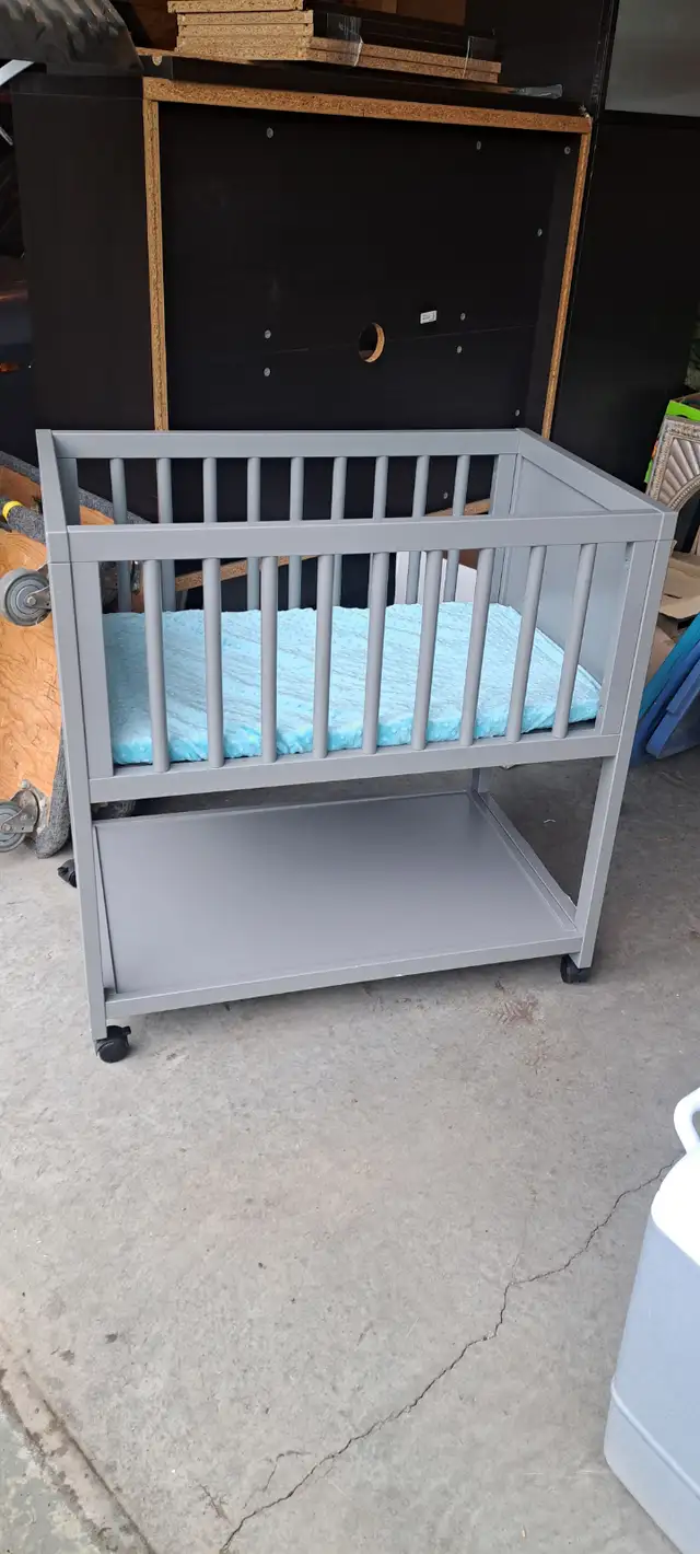 Mini Crib with Storage Shelf on Wheels in Cribs in Edmonton - Image 2