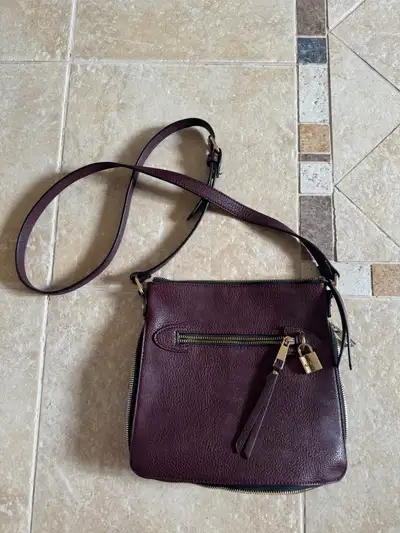 Burgundy crossbody bag excellent condition, View more