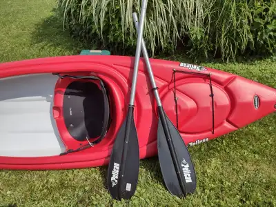 Like new. Quality paddle vest and paddles included