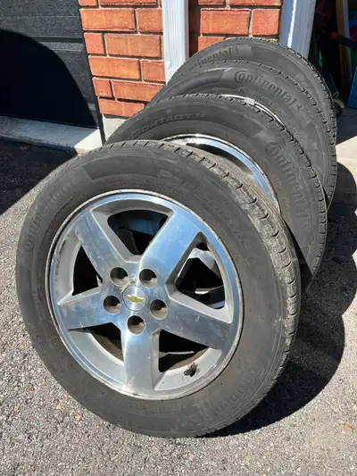 Selling a set of Continental, ProContact TX, All Season tires on factory rims. Size: P205/55R16 5x11...