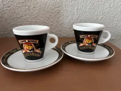 Details & Features • Design: Deep black exterior with the "Caffè Royal Universal" logo; gold-rimmed...