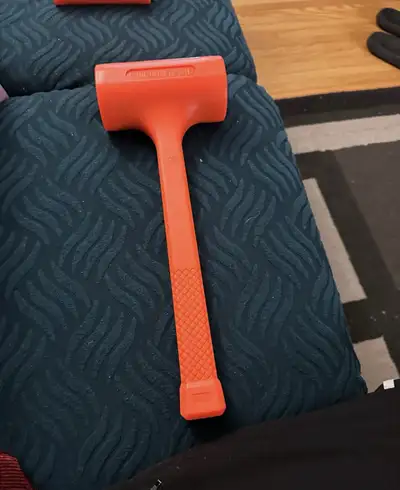 orange dead blow hammers., View more