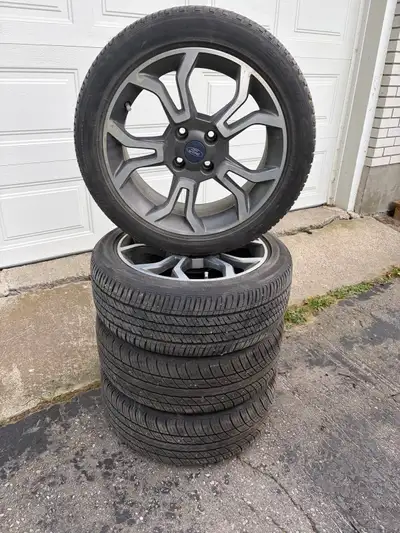 Set of 4 Bridgestone Ecopia Ep 422 205/50/17 all season tires and rims,1 tire has a plug as shown in...