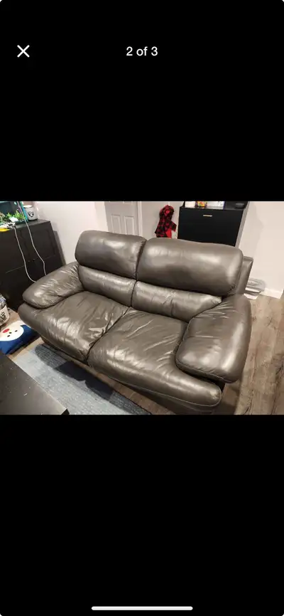 Genuine leather couch in great condition. Can deliver too anywhere in Winnipeg for free!