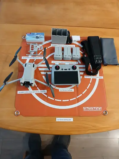 DJI Mini 3 Pro with multiples batteries, View more