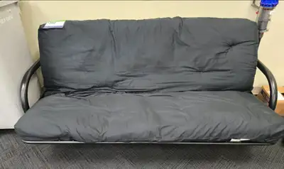 - Black Metal Framed Black Futon. - Clean and Sturdy Click Clack Fold out Sleeper. - Lightweight Alu...