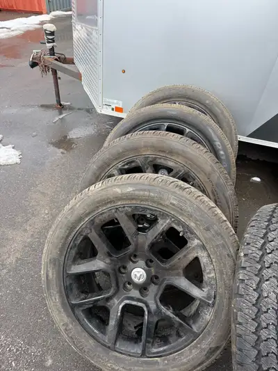 22” dodge ram stock rims with never Rodin hp tires 305 45 22 good shape no damage. $1500