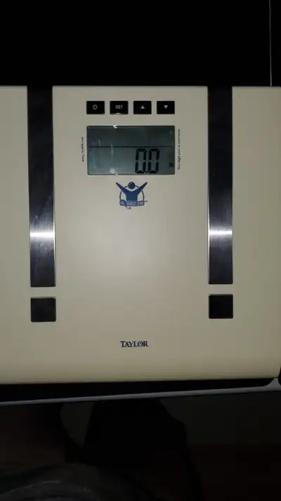 Bathroom scale. Measures in kg, lb and stones, selectable by small switch. Measures body composition...