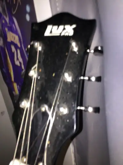 barely used Lyx Pro Les Paul style. comes with soft case, View more