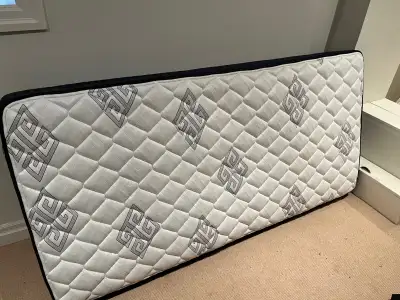 Selling a Kingsdown Twin XL mattress in excellent condition — barely used and only ever in a spare b...