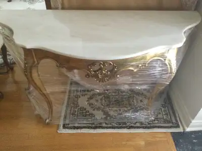 elegant decorative entry table light marble top and scrolled carved front and legs excellent conditi...