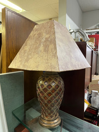 Lamp with patterned base