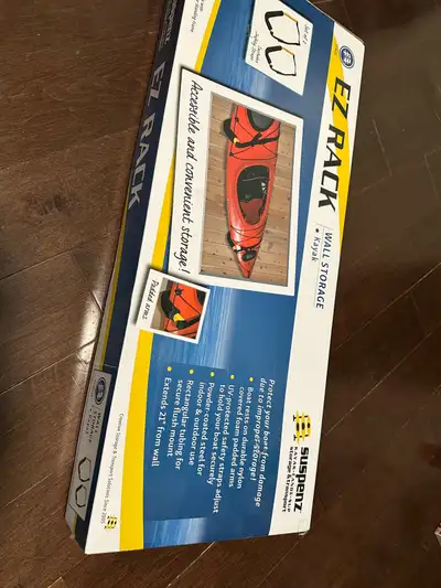 This is a new Suspenz EZ Rack Kayak Wall Storage system, perfect for securely storing your kayak and...