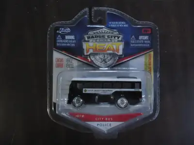 Jada Badge City Heat #12 City Bus Police (White Roof) . Dated: 2010 Never been removed from package...