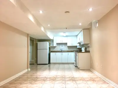 Spacious 2 Bedroom Apartment with full washroom with tub and full kitchen. Huge living room. Close t...