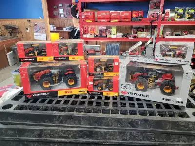 Versatile tractors 1/64 and 1/32 1/32 620 $90 1/32 550 50 year tractor $150 1/64 580 $35 1/64 620 $3...